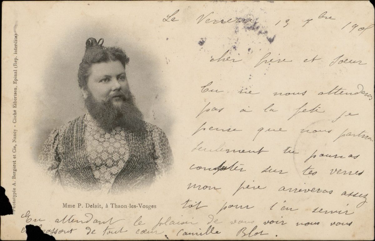 carte postale dont l'image est une femme avec une barbe